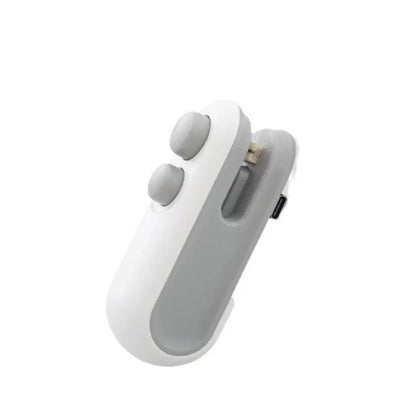 White and gray electronic device on a white background
